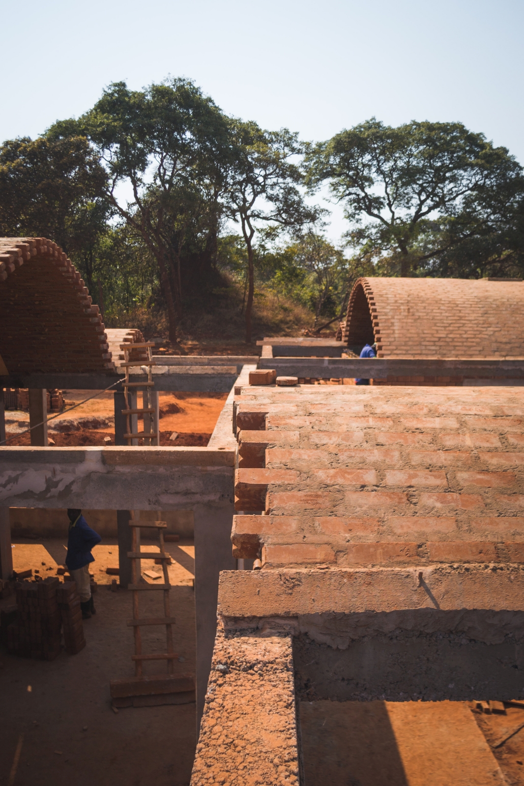 Cement stabilised earth bricks, CSEB, create new arch vaults for new hospital in Zambia.