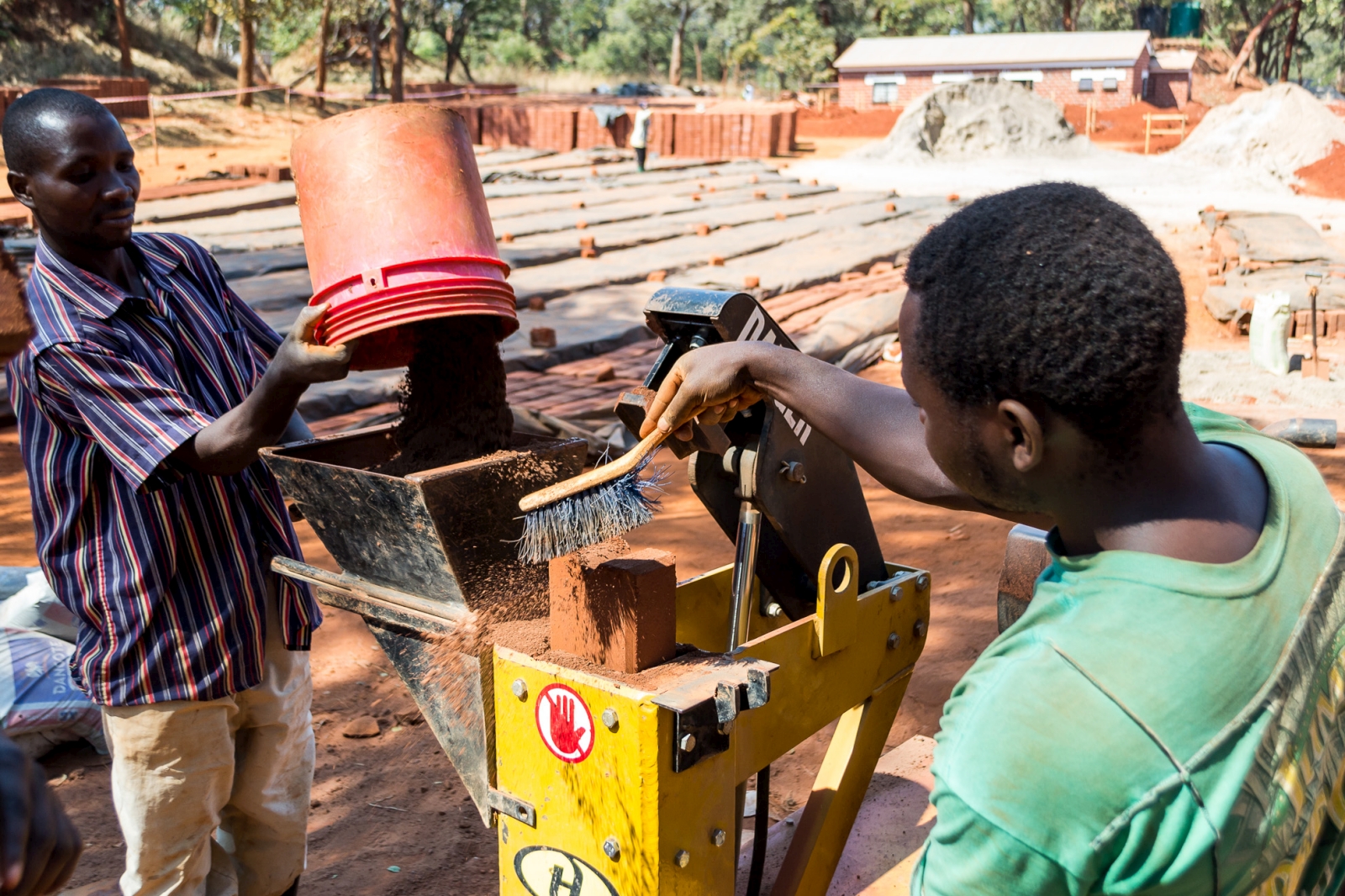 Cement stabilised earth bricks, CSEB, create new arch vaults for new hospital in Zambia.