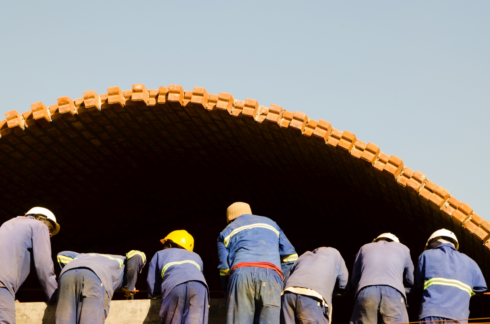 Cement stabilised earth bricks, CSEB, create new arch vaults for new hospital in Zambia.